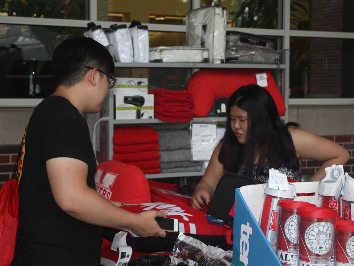 Students shop for residence hall room supplies.